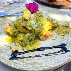 Avocado ravioli with basil pesto, pistachios and fresh tomatoes   at Organic in Mallorca