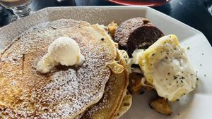 All Vegan Ziggy - 2 pancakes, just egg (added cheese), soy sausage and home fries.   at Cornucopia's Noshery in Amityville