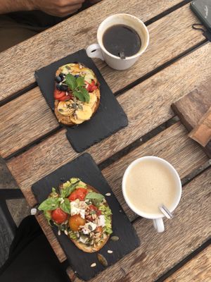 tostadas de crema de cacahuete con fruta y de aguacate, tomate y ‘queso’ feta. at Esquina in Lanzarote