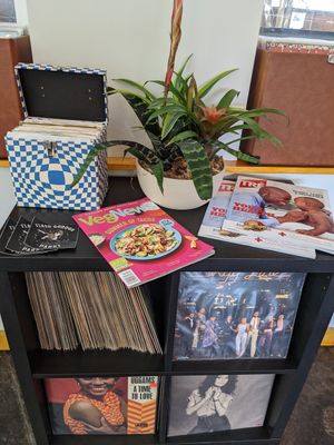 Some of the vinyl collection, with magazines at Mo' Brunch + Brews in Houston