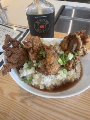 Hot honey chik’n and grits at Mo' Brunch + Brews in Houston