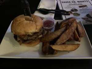 Black & Bluesy burger with regular fries  at Mo' Brunch + Brews in Houston