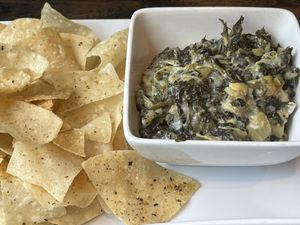 Spinach artichoke dip : super cheezy great!!  at Mo' Brunch + Brews in Houston