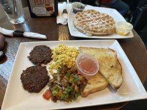 sausage patties, scrambled Just Egg, breakfast hash, sourdough toast, wafflees  at Mo' Brunch + Brews in Houston