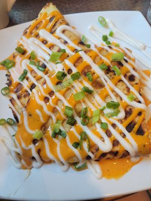 Breakfast Quesadilla with sausage at Mo' Brunch + Brews in Houston