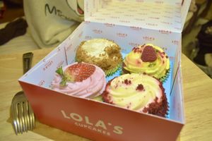 Strawberry, caramel, red velvet, raspberry&passion fruit  at Lola's Cupcakes - Selfridges in London