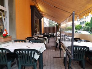 Outdoor seating at Casa d'Italia in Bern