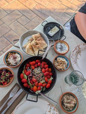 Startersstarters (vegan: salad, bread, eggplant salad, chickpeas with tahini, couscous; vegetarian: feta, tzatziki, greek yogurt dip) at Agora Tavern in Paphos