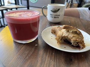 Beetroot latte, blueberry croissant and decaf oat latte  at Pinch in South West London