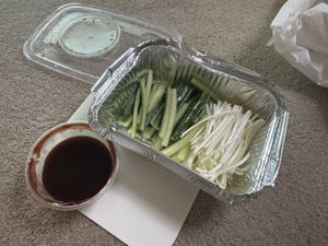 With the hoisin sauce and veg sides   at Miss Li's Kitchen Chinese & Malaysian Takeaway in Wednesbury