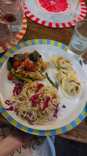 Cabbage and apple salad, Plums Agnolotti, and Legume tempeh at Brac Libreria di Arte Contemporanea in Florence