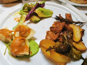 Vegan combo dish (seitan, avocado, ravioli) at Brac Libreria di Arte Contemporanea in Florence