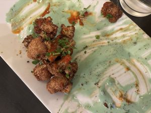 Fire cali (fried cauliflower with tahini and hot sauce)  at Sultan Mediterranean Grill in Moab