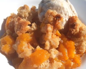Southern Peach Cobbler à la Mode
Mmmm ... lots of sweet southern charm here, Plump juicy peaches baked with a pinch of warm spices and sugar with a classic cobbler topping paired  at Chikun Shak in Mount Brydges