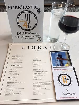 The Liora-Baltimore menu and Charm'tastic Mile Brochure. at Liora in Baltimore
