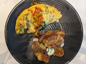 Spinach and almond feta omelette with fingerling potatoes at Liora in Baltimore