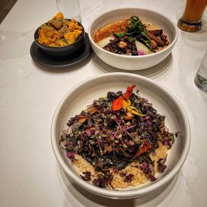 Smoked mushrooms and grits, mac and cheese, spicy noodles at Liora in Baltimore