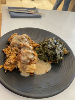 Biscuits and gravy w/ side of greens   at Liora in Baltimore