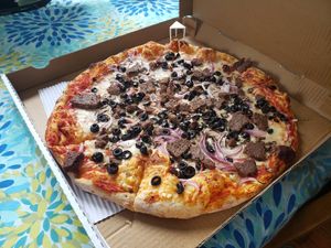 Vegan sausage, mushrooms, onion and black olives pizza at Verrazzano Pizza in Half Moon Bay