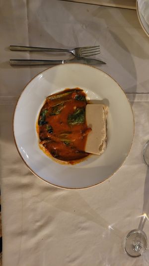 Fresh cashew cheese with Swiss chard and fresh tomatoe sauce! at Kaneo Summer Garden in Ohrid