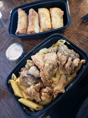 Mac n cheeze with fried chkn  and cheeze steak egg rolls at Vegan Bodega in New Britain