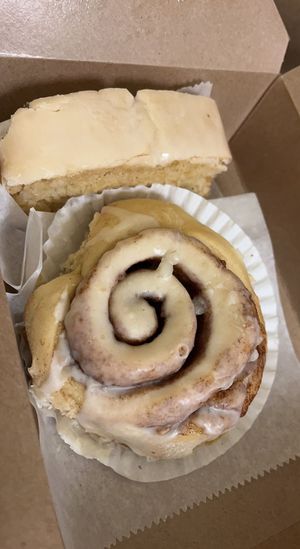 Cinnamon roll with lemon cake slice  at WeVegan Cafe in Tampa