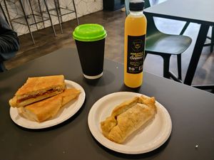 Breakfast cuban sandwich and egg, sausage and cheese hand pie. at WeVegan Cafe in Tampa