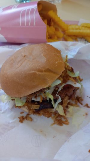 Burger with fries at Naked Burger - 6ème in Paris