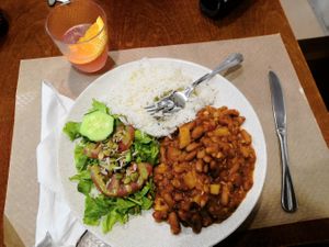 Lunch of the day (bean and pineapple stew, cold tea, also had egg soup) at Santo Seitan in Sao Miguel