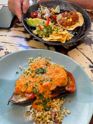 Lasaña de berenjena con trigo sarraceno y Mezze Plate de Mexico  at La Mujer de Verde in Mallorca