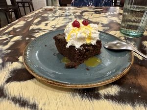Chocolate Brownie with Passion Fruit Sauce   at La Mujer de Verde in Mallorca