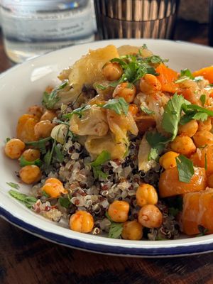 Tricolor quinoa with lemon vegetable tagine, harissa sauce, and crispy chickpeas.  at La Mujer de Verde in Mallorca