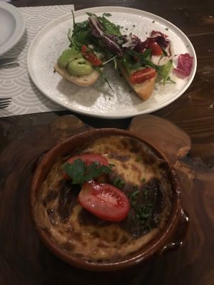 Vegan moussaka and avocado purée with on toast at Oskars in Kefalonia