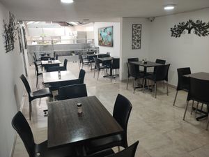 Main dining room, also has another dining room upstairs at Soy Vida - Pasadena in Bogota