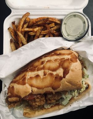 Ain’t gator po’boy with seasoned fries at Souley Vegan in San Francisco