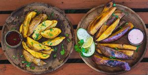 Herbed potato wedges with vegan aioli sauce at Tribearth  in Diani Beach
