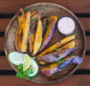 Sweet potato wedges with vegan chili mayonnaise sauce at Tribearth  in Diani Beach