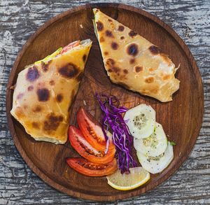 Avocado & tomato chapati wrap. High Fiber Avocado & Tomato Wrap at Tribearth  in Diani Beach
