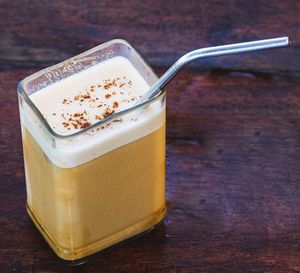 Iced Latte With Oat Milk Served With Homemade Syrup at Tribearth  in Diani Beach