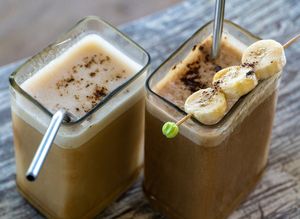 Iced Latte With Oat Milk Served With Homemade Syrup at Tribearth  in Diani Beach