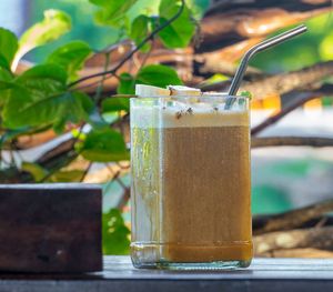 Iced Banana Date Latte. Fresh roasted coffee shot, banana, dates, plant based milk  at Tribearth  in Diani Beach