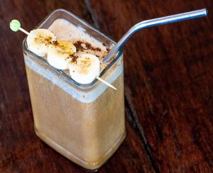 Iced Banana Date Latte. Fresh roasted coffee shot, banana, dates, plant based milk  at Tribearth  in Diani Beach