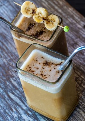 Iced Banana Date Latte. Fresh roasted coffee shot, banana, dates, plant based milk  at Tribearth  in Diani Beach