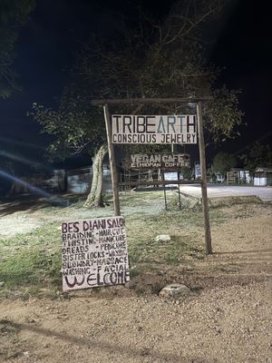 The sigh next to the street  at Tribearth  in Diani Beach