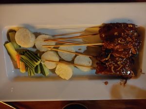 Peanut BBQ-y Tempeh Satay is to die for. Sweet, smoky, sticky and peanutty at Bandung Indonesian Restaurant in Madison