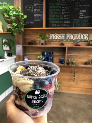 Açaí bowl with strawberries, blueberries, banana, gf granola, almond butter, chia seed and shaved coconut ❤️ at North Beach Juicery in San Clemente