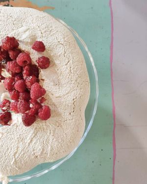 Vegan maringue with fresh raspberries served with vegan custard sauce at Inga's Veggie Heaven in Nicosia