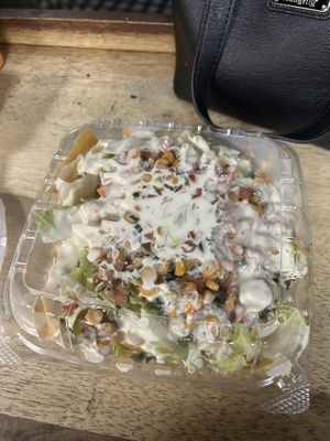 Nachos- you gotta dig to get to the cheese and the lettuce is thiiiickly cut but they’re good!  at Hue Cafe & Apothecary in Owings Mills