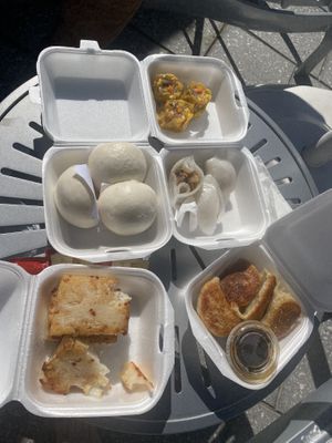 (Left top) egg custard buns, (below) turnip cake, (top right) siu mai, mixed mushroom dumpling, pan fried pork dumpling  at Chef Kenny's Vegan Dim Sum in Las Vegas
