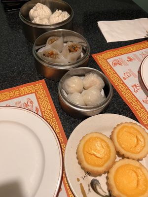 From the top, steamed vegan pork buns, steamed mixed mushroom dumplings (my fav), steamed vegan shrimp dumplings, and vegan egg custard tarts (perfect end).  Plenty of food for 2!  at Chef Kenny's Vegan Dim Sum in Las Vegas